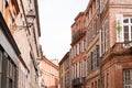 Pink building alley in the heart of the old city of Toulouse Haute-Garonne in France