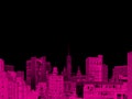 Pink buildings of the New York City skyline contrast against the black night sky with empty space Royalty Free Stock Photo