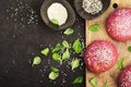 Pink buns for the vegetable Burger on the basis of beet with sesame seeds on dark background. Top view Royalty Free Stock Photo