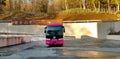 Pink bus parked and waiting for tourist get in car and travel to landmarks of Japan for group of trip