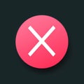 a pink button with an x on it