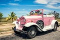 Pink cabriolet taxi, retro car