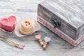 Pink cake heart with an old box. Royalty Free Stock Photo