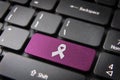 Pink Cancer ribbon keyboard key, Health background Royalty Free Stock Photo