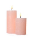 Pink candles with wicks isolated Royalty Free Stock Photo