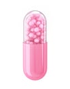Pink capsule pill with spheres inside isolated on white. Clipping path included