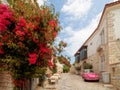 Pink car on a narrow street, Turkey