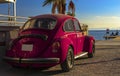 Pink car , sea view