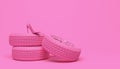 Pink car wheel and pink women`s shoe on a pink background. Creative conceptual illustration in a glamorous girlish style. Copy