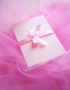 Pink cardboard with satin bow