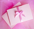 Pink cardboard with satin bow