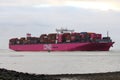 Pink cargo ship one columba navigates towards antwerp