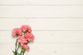 Pink carnation flower bouquet on rustic wood Royalty Free Stock Photo