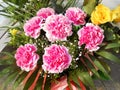 Pink carnations and yellow roses bouquet