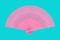 Pink Carved Wooden Hand Fan in Duotone Style. 3d Rendering Royalty Free Stock Photo