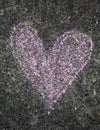 Pink chalk heart of sidewalk