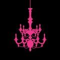 Pink chandelier on black background.