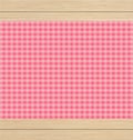 Pink Checkered Tablecloth on White Oak Wooden Table