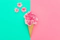 Pink cherry flowers in ice cream waffle cone minimal Royalty Free Stock Photo