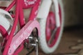 Pink child`s bicycle closeup Royalty Free Stock Photo