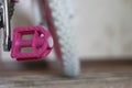 Pink child`s bicycle closeup Royalty Free Stock Photo