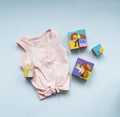 Pink children`s t-shirt for girls with playing cubes