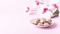 Pink chocolate bar and flower on pink background. Ruby new chocolate. New pink sweet dessert Royalty Free Stock Photo