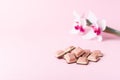 Pink chocolate bar and flower on pink background. Ruby new chocolate. New pink sweet dessert Royalty Free Stock Photo