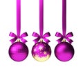 Pink christmas balls hanging on ribbon with bows, isolated on white Royalty Free Stock Photo