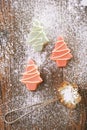 Pink christmas tree homemade sweets in rustic style on wooden d