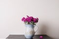 Pink chrysanthemum in a clay rarity vase