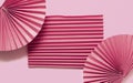 Pink circle handmade paper fans on pink background. Chinese New Year 2023 background Royalty Free Stock Photo