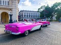 Pink classic Cuban vintage car. American classic car on the road in Havana, Cuba. Royalty Free Stock Photo