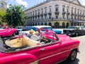 Pink classic Cuban vintage car. American classic car on the road in Havana, Cuba. Royalty Free Stock Photo