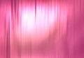Pink closed curtain with light spots and shapes in a theater for your design. Shiny metal 3D bright pink drapes reflected smooth Royalty Free Stock Photo