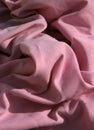 Pink cloth table napkins clumped up and wrinkled Royalty Free Stock Photo