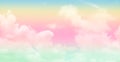 Pink cloud pastel color with yellow and blue, green sky.