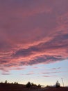 Pink Cloud Sunset over a lonely road Royalty Free Stock Photo
