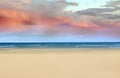 pink clouds Beautiful beach with white sand turquoise ocean water and blue sky on sunny day. Panoramic view background for summ Royalty Free Stock Photo