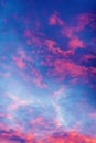 Pink clouds on vibrant blue sunset sky as natural background Royalty Free Stock Photo