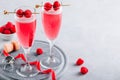 Pink cocktail with champagne or prosecco and fresh raspberries for  Valentine day Royalty Free Stock Photo