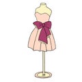 Pink cocktail dress with a bow. Ball gown mannequin on white background.