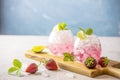 Pink cocktail with lime, crushed ice, strawberries and mint on the light background, selective focus image, copy spice for you Royalty Free Stock Photo