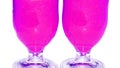 Pink cocktails glasses couple close up isolated on white background Royalty Free Stock Photo