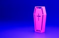 Pink Coffin with christian cross icon isolated on blue background. Happy Halloween party. Minimalism concept. 3D render