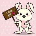 Pink color background with hearts silhouettes and cute kawaii animal bunny standing with wooden sign love you and heart Royalty Free Stock Photo