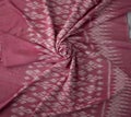 Pink color hand woven cotton fabric in Thai ancient style pattern Royalty Free Stock Photo