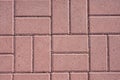 Pink color street clean tiles as a background.