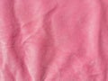 Pink color velvet fabric texture top view. Female blog rose velour background. Smooth soft fluffy velvety satin cloth Royalty Free Stock Photo