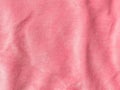 Pink color velvet fabric texture top view. Female blog rose velour background. Smooth soft fluffy velvety satin cloth Royalty Free Stock Photo